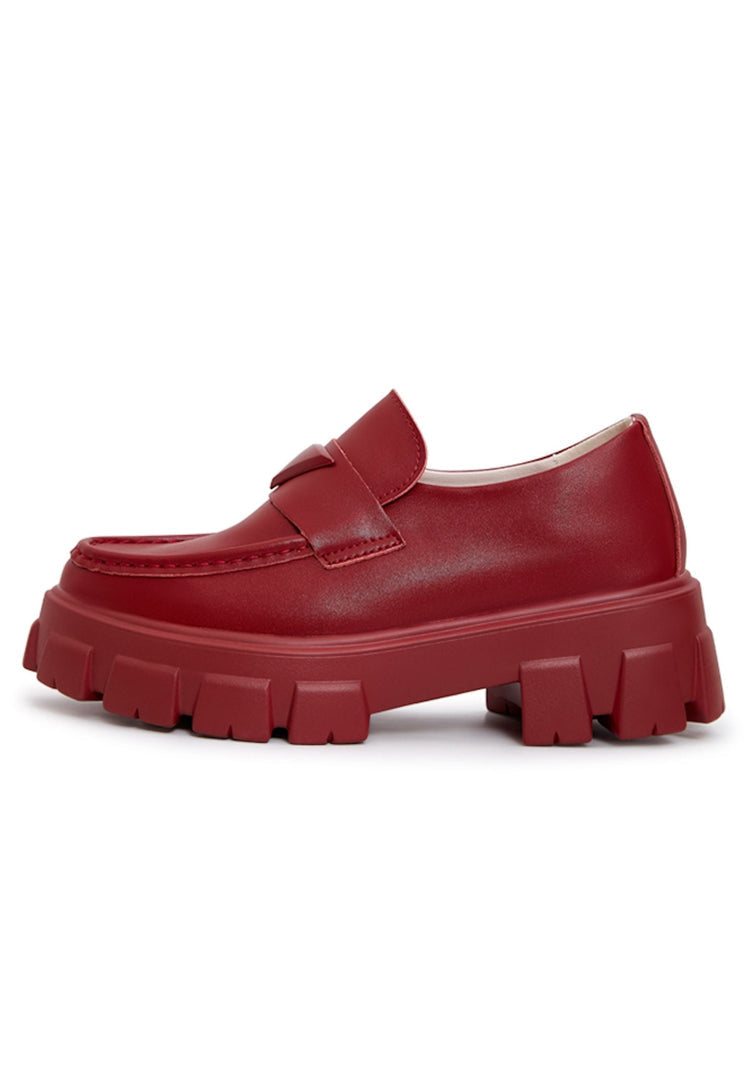 A stylish pair of chunky leather platform loafers in rich Bordeaux color - perfect for on-the-go chic comfort.
