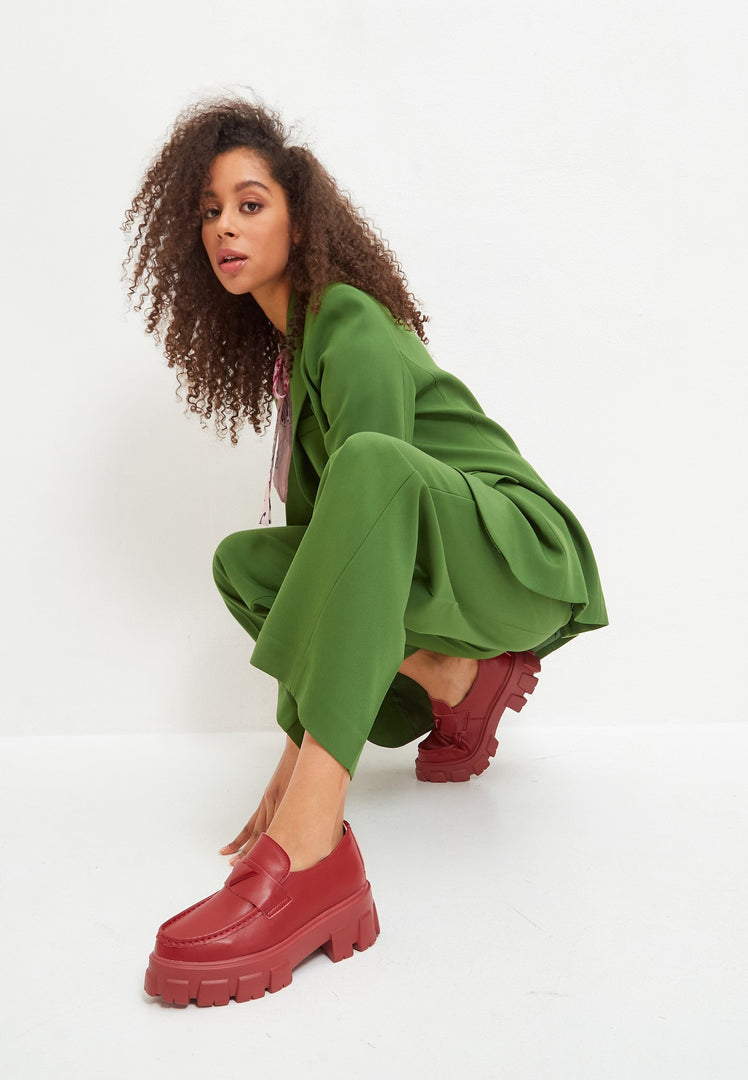 A pair of stylish chunky leather platform loafers in Bordeaux color.
