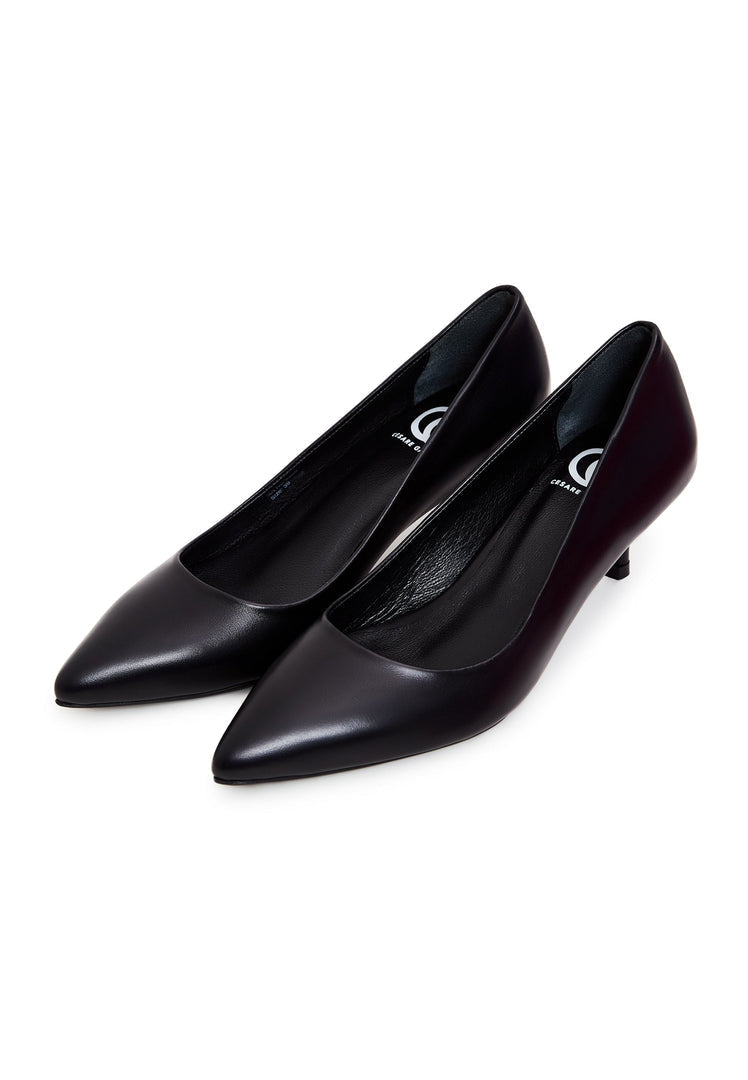 A pair of elegant black pumps, luxury footwear for a sophisticated look.