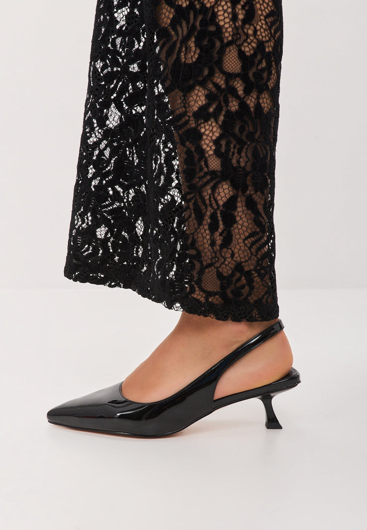 A stylish pair of black stiletto pumps, perfect high heeled shoes for women.