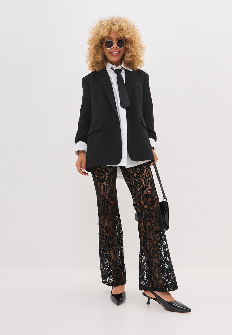 A close-up image of a pair of stylish black stiletto pumps, the perfect high-heeled shoes for women's evening wear.