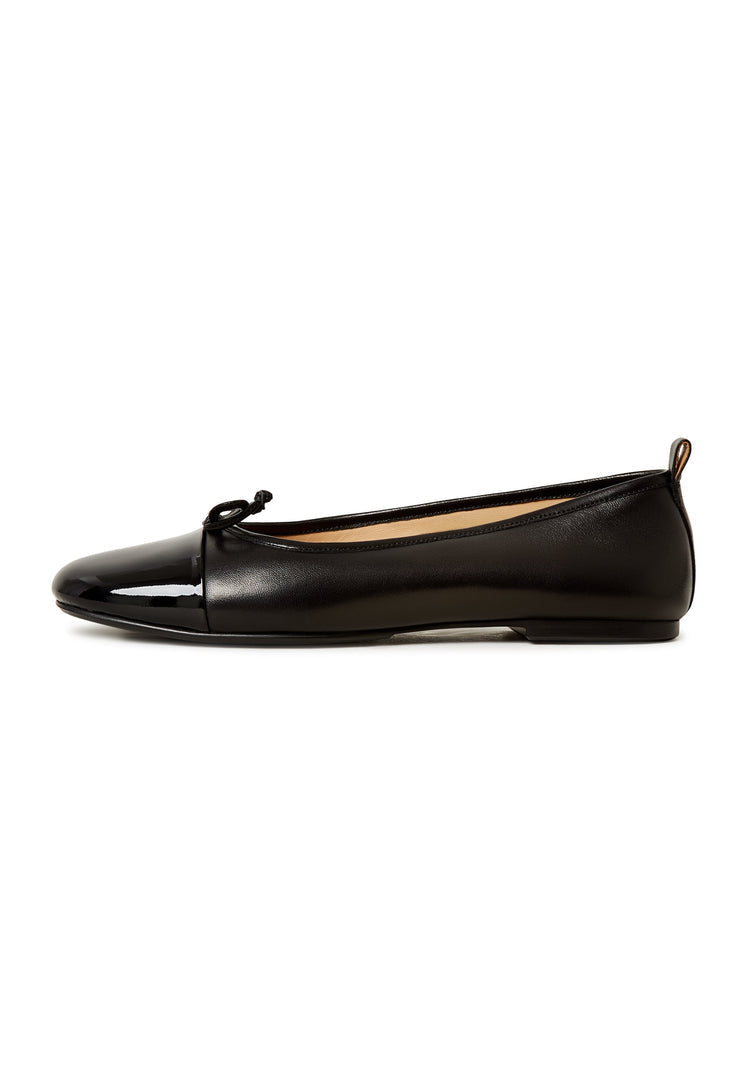 A stylish pair of black patent leather ballerinas, the Mila ballerinas, perfect for women's casual or formal attire.