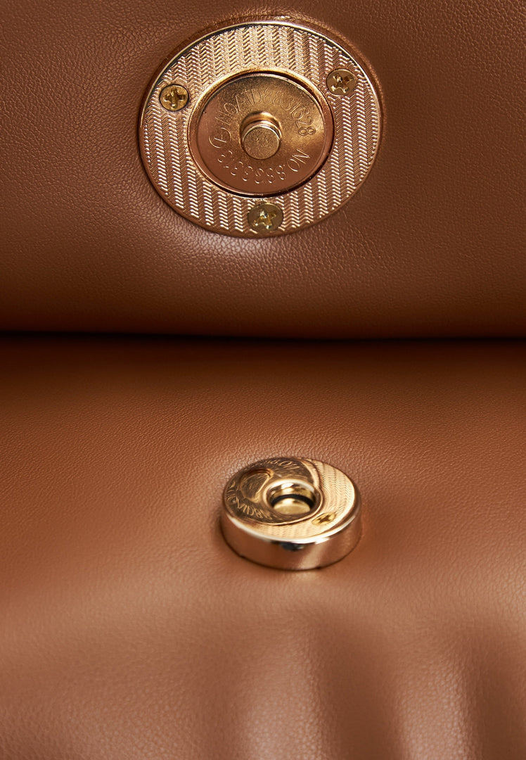 A stylish brown quilted clutch bag perfect for any outfit or occasion.