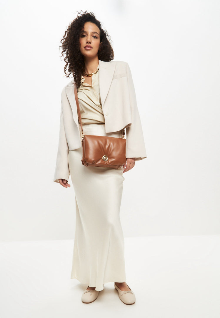 A stylish brown quilted clutch bag perfect for any outfit or occasion.