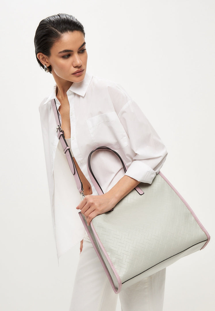 A chic and versatile grey tote bag - the perfect accessory for any outfit.