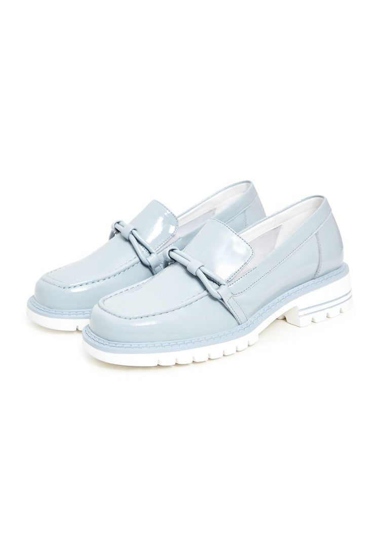 A stylish pair of women's fashion loafers in a beautiful shade of blue, featuring block heels for a trendy look.