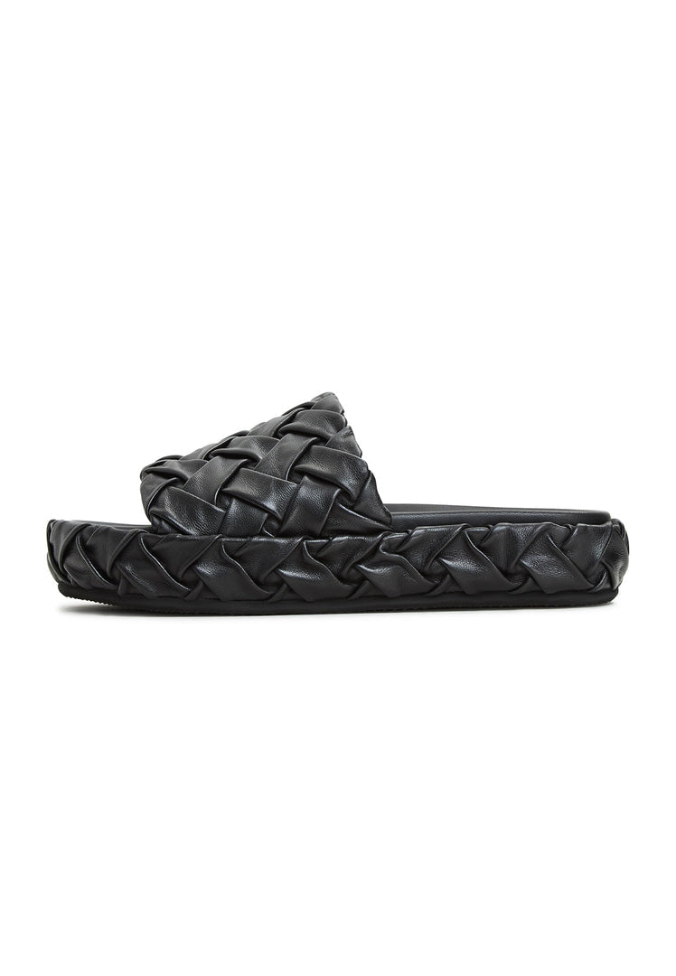 A trendy pair of Antonella Platform Slippers in classic black for women's fashion, ideal for slipping on and stepping out in style.