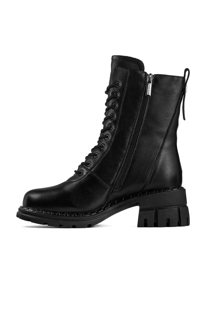A stylish pair of women's block heeled winter boots with a classic design, featuring a cozy wool insole for comfort.