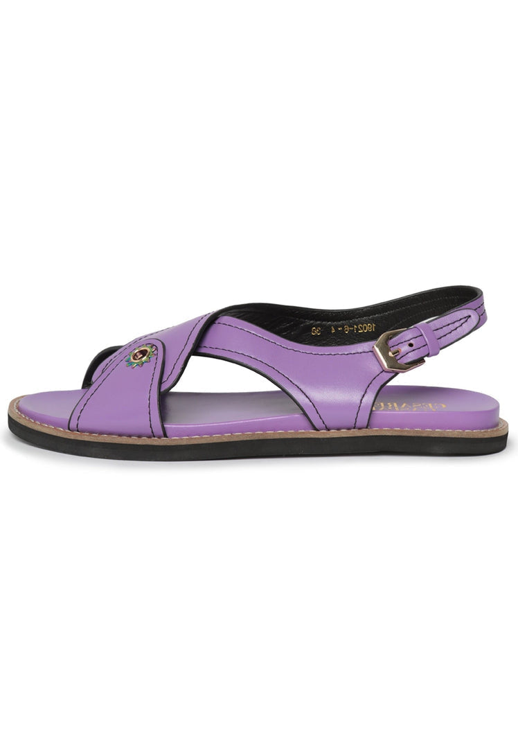 A close-up image of stylish and comfortable women's flat sole sandals, perfect for summer.
