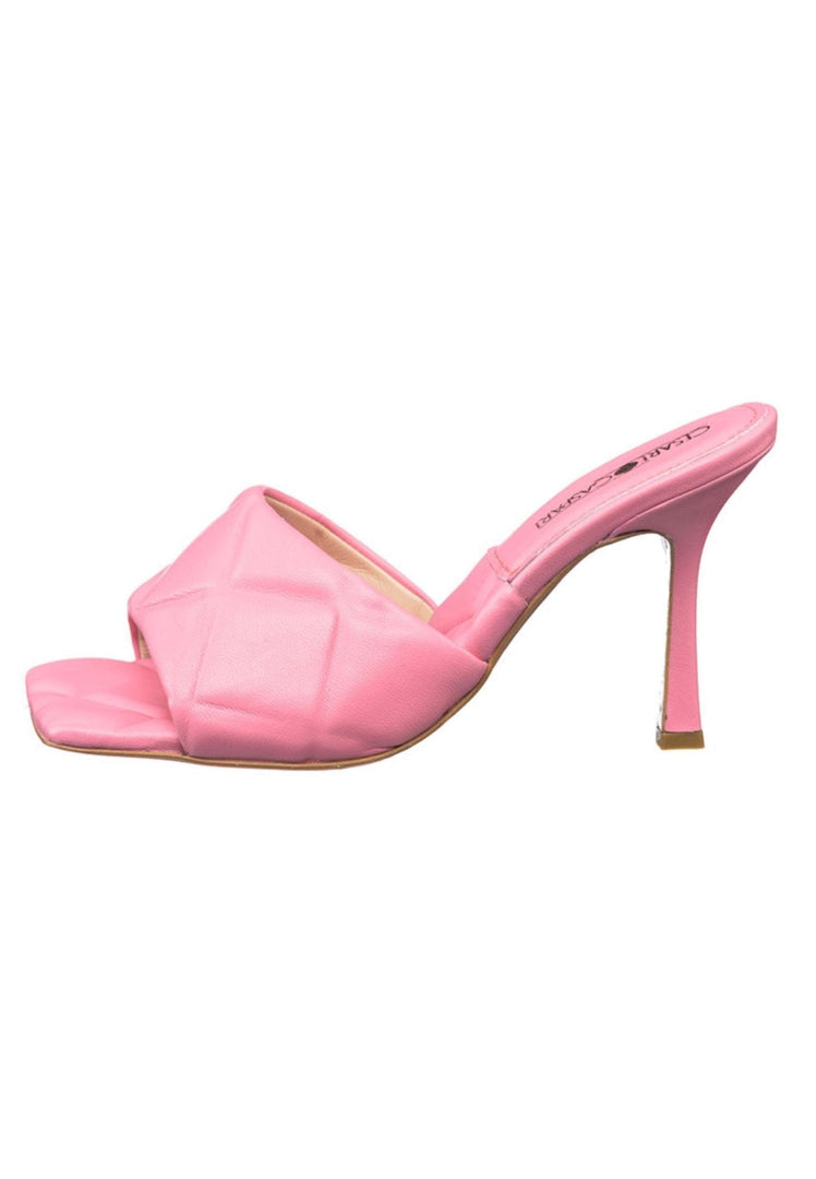A trendy pink heeled square toe mule, the perfect addition to any women's fashion footwear collection.