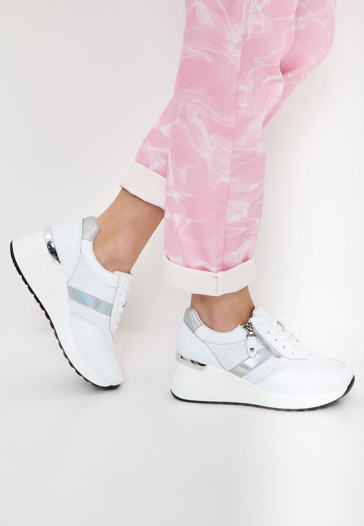 A pair of stylish white leather sneakers, perfect for any casual outfit.