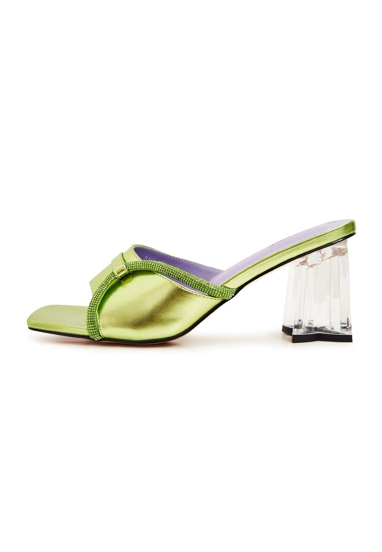 A stylish pair of fashionable women's heel mules in green with a unique star-shaped block heel design.