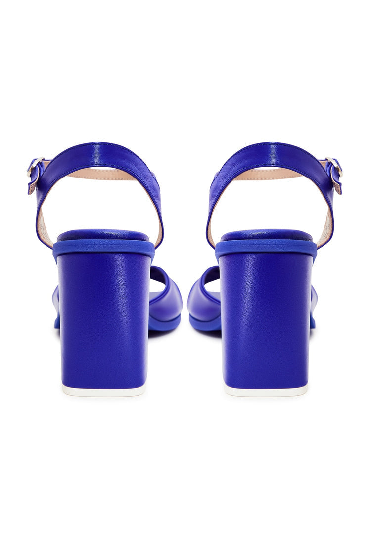 A pair of elegant blue block heels, the timeless and stylish choice for classic footwear.