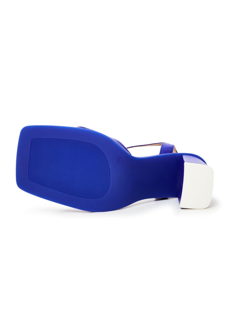 A pair of elegant blue block heels, a timeless and stylish choice for classic footwear enthusiasts.