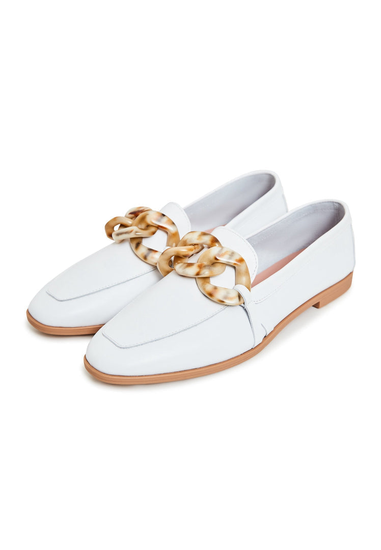 A stylish pair of white leather loafers with a flat sole, the perfect classic footwear for any outfit.