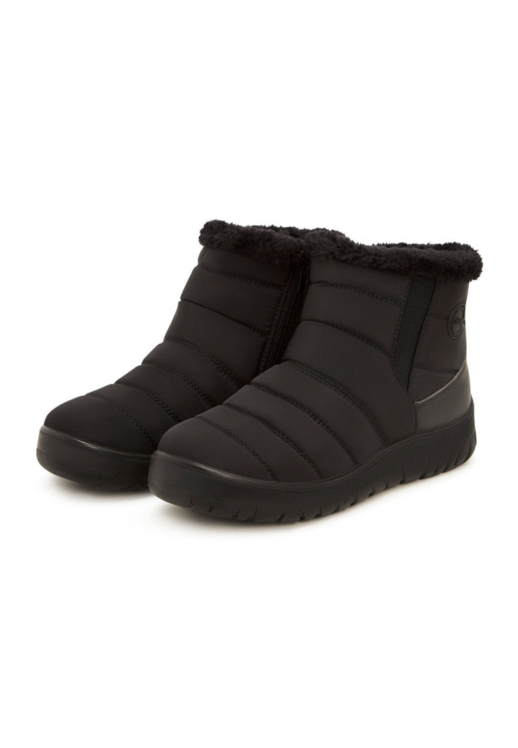 A trendy pair of women's chunky platform boots perfect for cold weather, great for winter fashion.