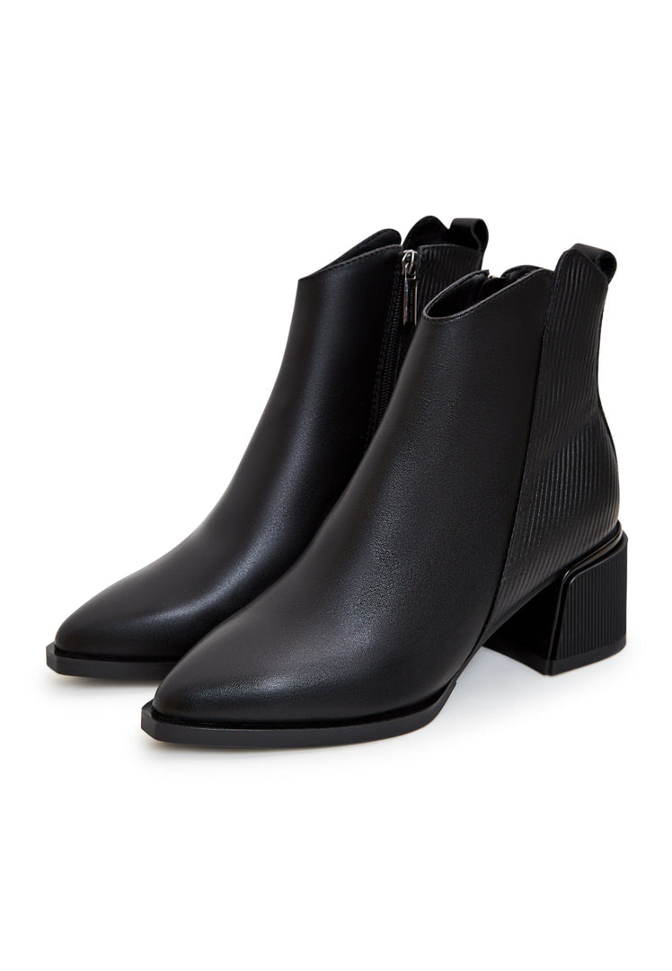A stylish pair of affordable black suede ankle boots for women, perfect for casual wear.