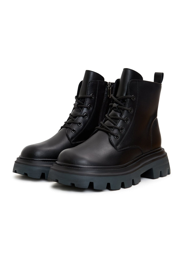 A stylish pair of designer lace-up leather booties, perfect for those who appreciate luxe footwear and high-end shoes.