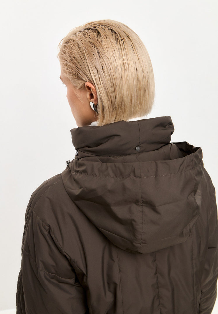 Stay warm and stylish with this fashionable long quilted coat in brown, the perfect women's outerwear for winter.