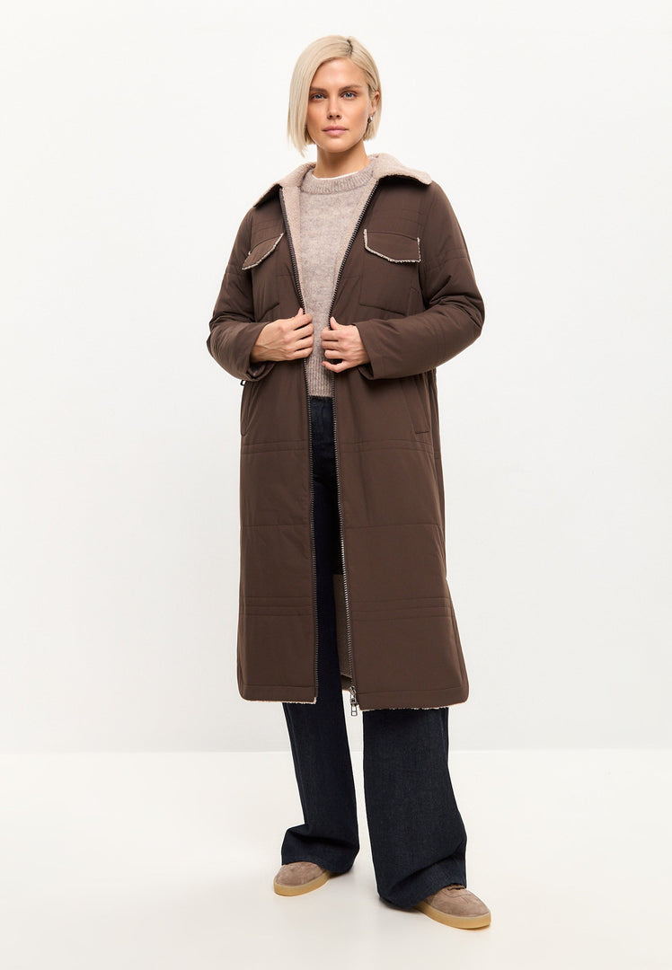 Stay warm and stylish this winter with a trendy long belted shearling coat featuring a luxurious shearling collar - the perfect addition to your winter wardrobe.