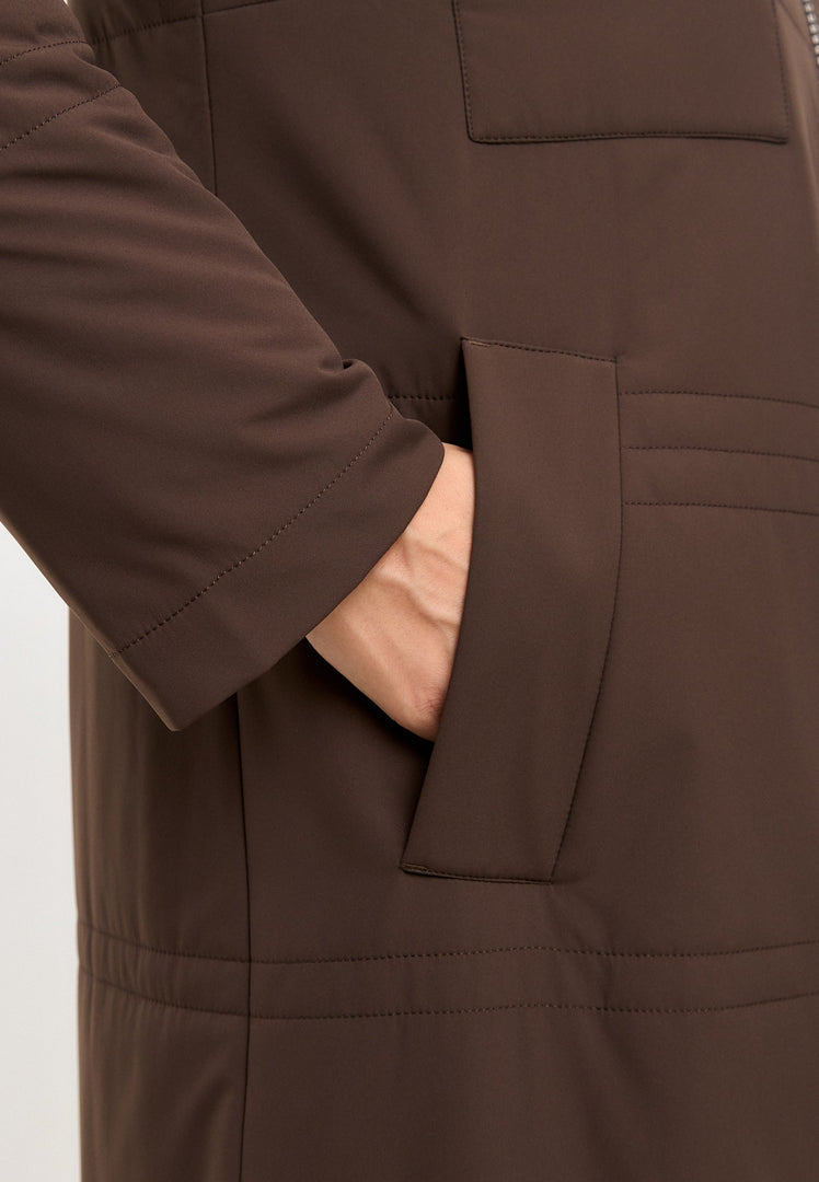 A fashionable winter shearling coat with a belted design, shearling collar, and a trendy, stylish look.