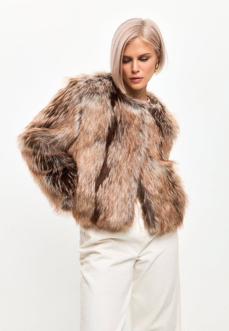 A stylish and warm faux fur jacket in luxe brown, perfect for eco-friendly fashion enthusiasts seeking stylish winter outerwear.