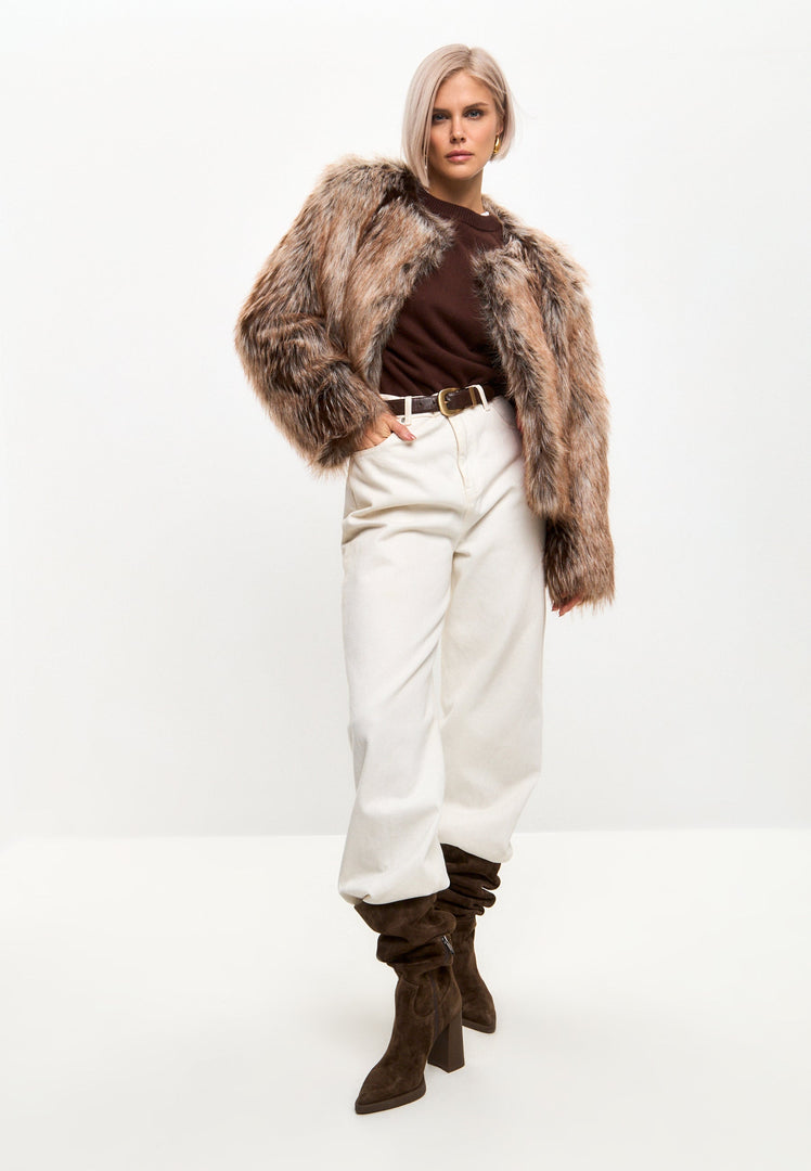 Stay cozy and chic this winter in a luxe brown faux fur jacket, the ultimate stylish and eco-friendly fashion statement.