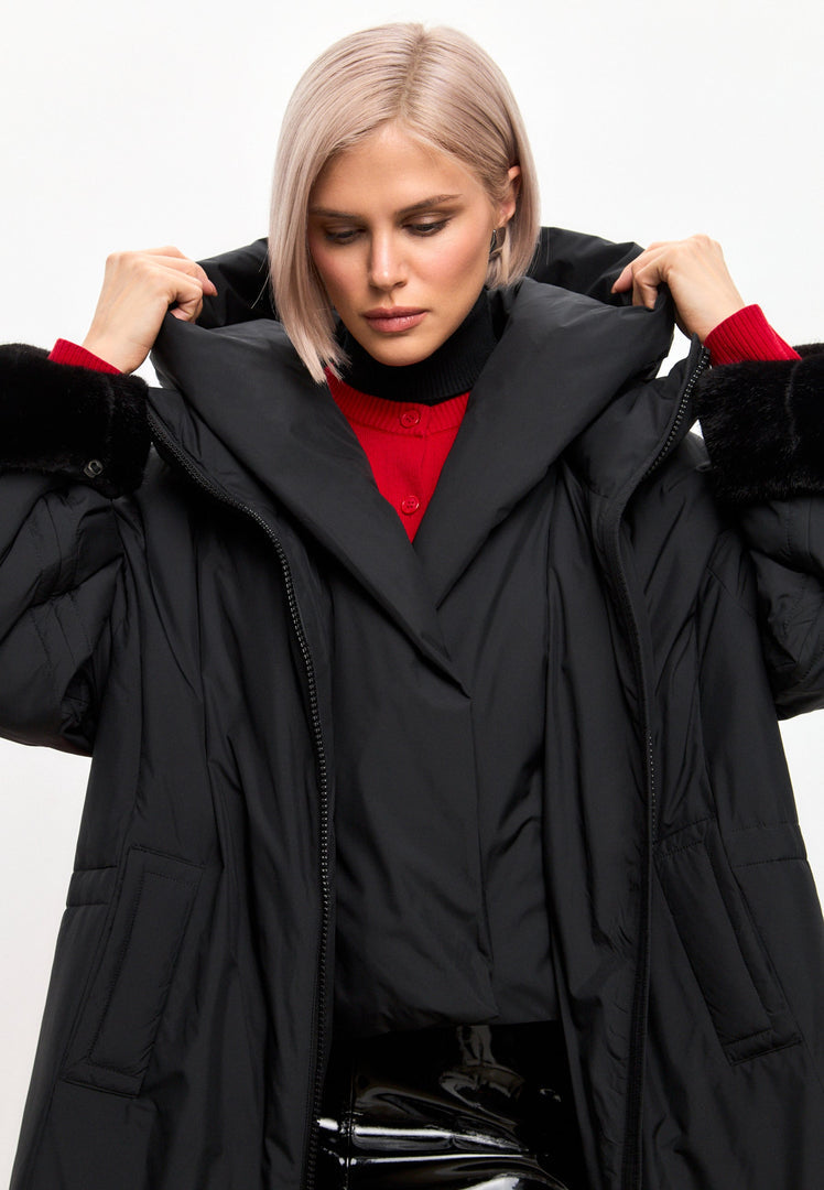 A stylish and cozy black oversized puffer coat with faux fur cuffs, perfect for plus size outerwear in women's fashion.