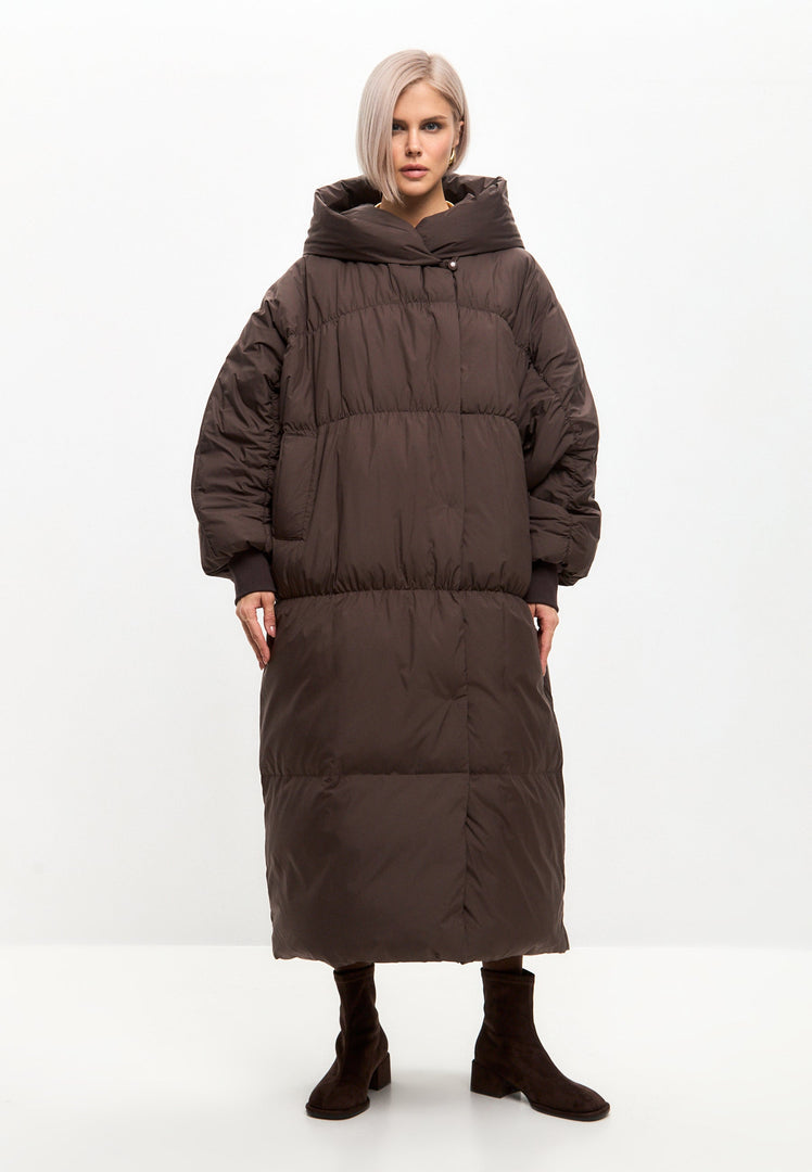 Stay warm and stylish this winter with a plus size chocolate puffer jacket, the perfect oversized outerwear choice for the season.