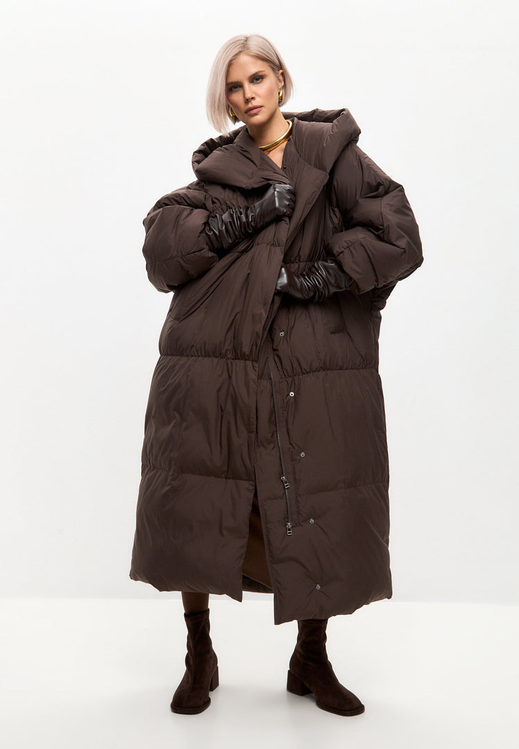 A stylish chocolate oversized puffer coat, perfect for winter with its cozy design, ideal for staying warm in plus size outerwear.