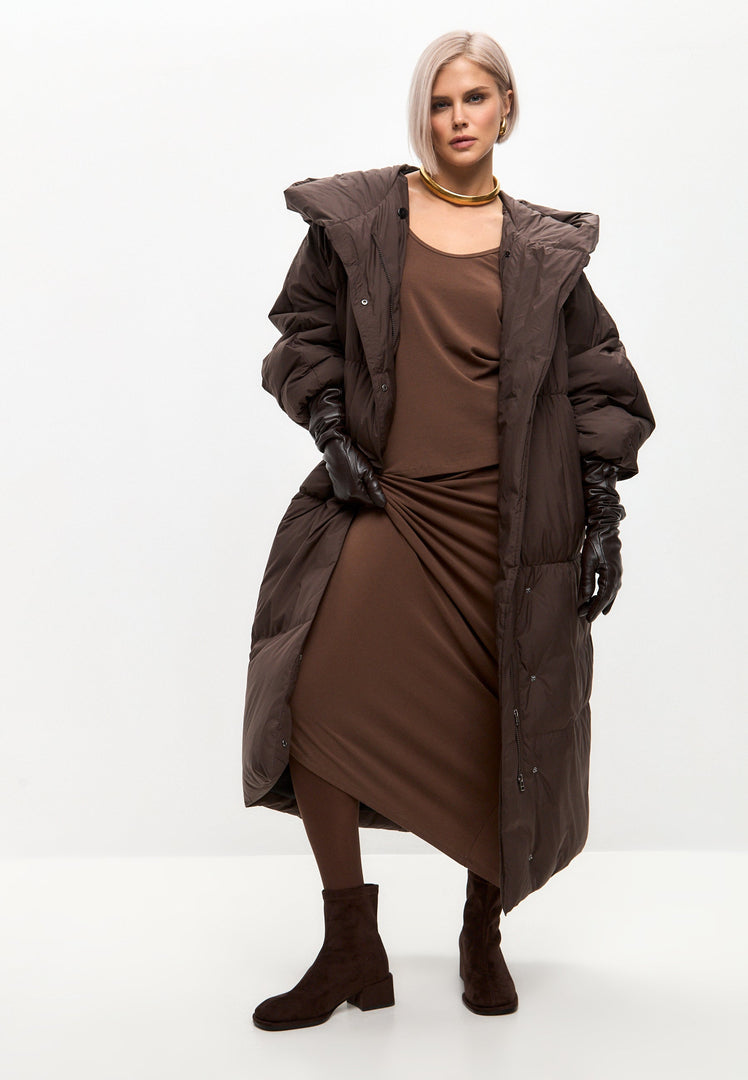 Stay warm and stylish this winter with an oversized chocolate puffer jacket, perfect as plus size puffer coat for chilly days.