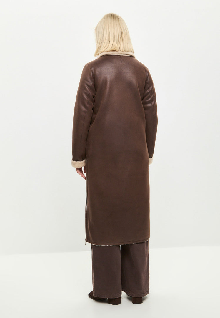 A stylish women's reversible shearling coat in brown faux fur, a versatile long shearling jacket perfect for cold weather, the ultimate brown faux fur outerwear for women.