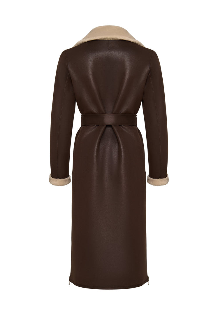A stylish brown faux fur coat that can be reversed into a cozy shearling jacket, the perfect long outerwear option for women.