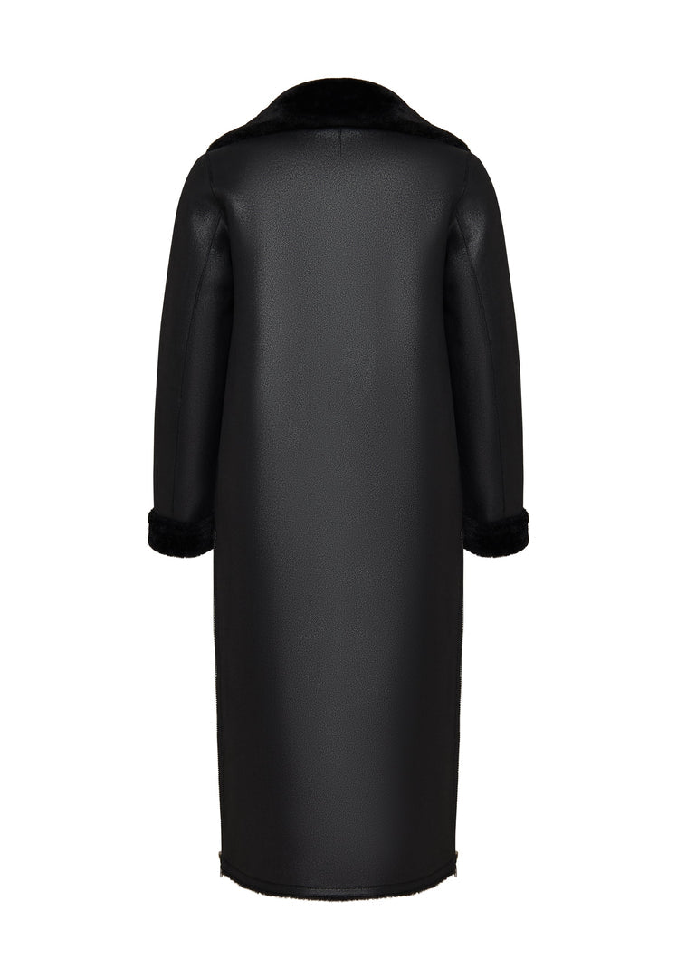 A stylish black shearling coat, perfect for winter days. This faux shearling jacket is reversible and trendy outerwear for women.