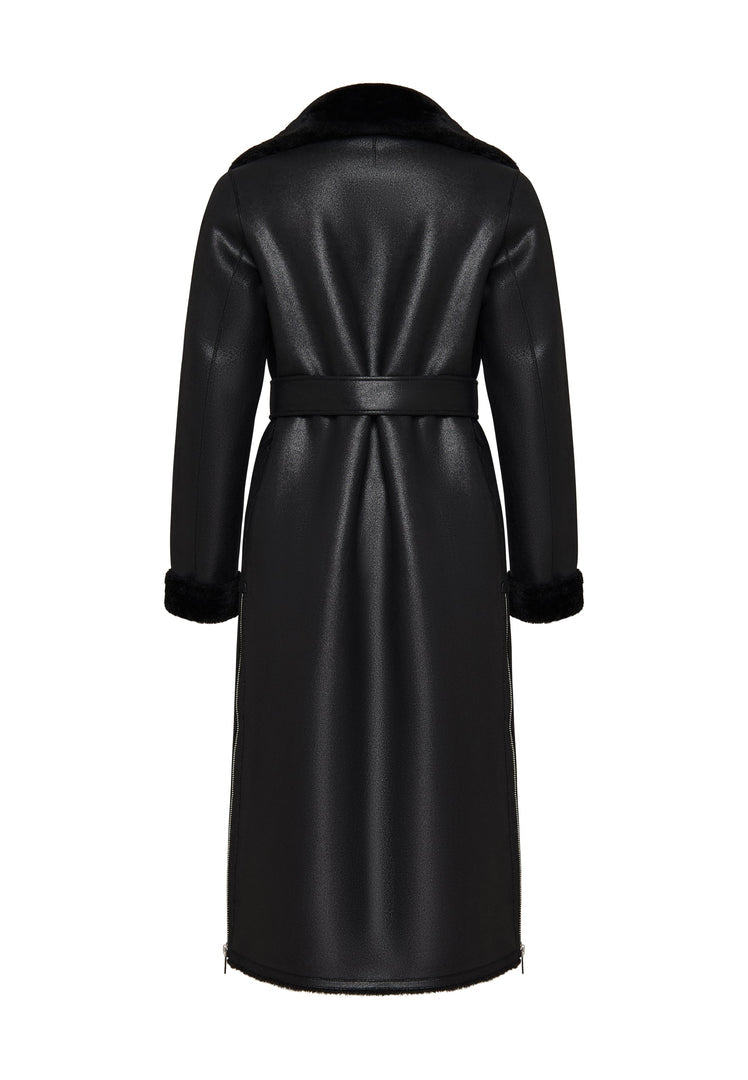 A stylish black shearling coat, perfect for the winter season. This faux shearling jacket is reversible and trendy women's winter outerwear.