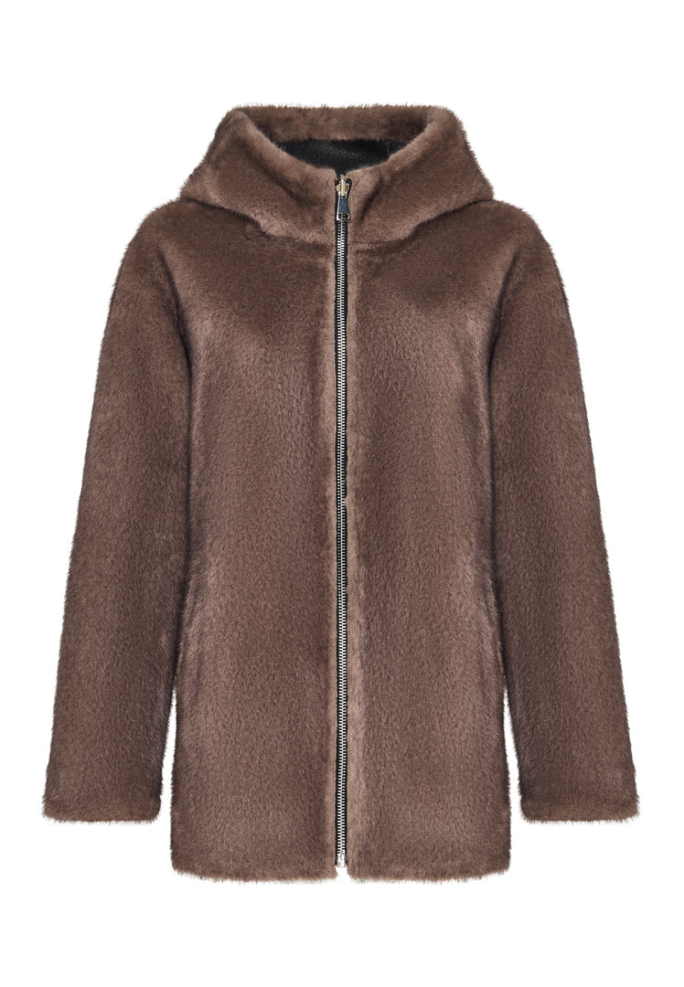 A trendy reversible faux leather jacket with faux fur trim, perfect for stylish vegan leather outerwear enthusiasts.