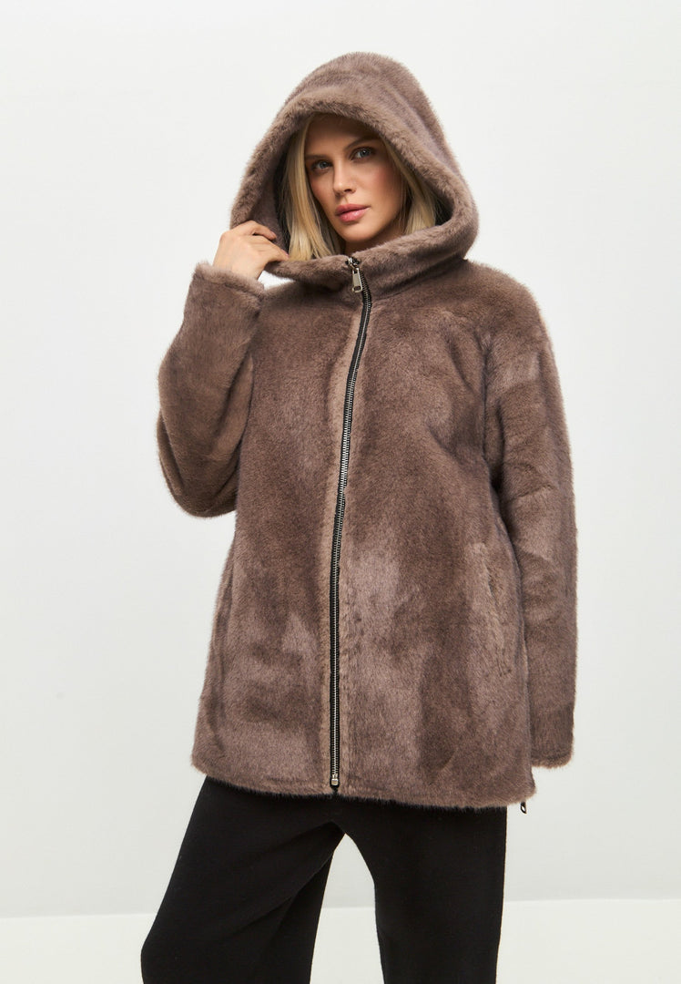 A fashionable reversible faux leather jacket with faux fur trim details, perfect for a stylish outerwear look.