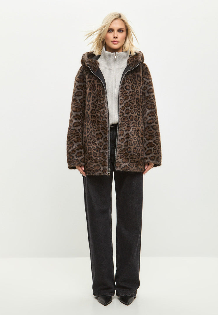 A stylish women's winter jacket with reversible faux leather and leopard faux fur trim, perfect for adding a trendy touch to any outfit.