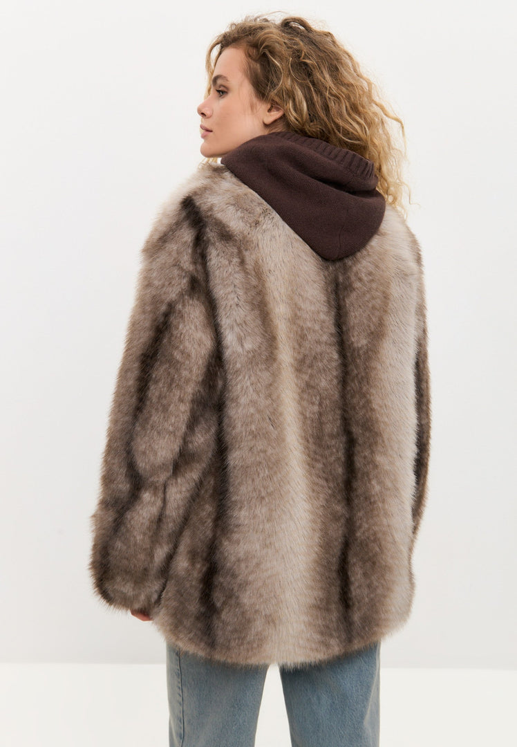 A luxurious faux fur brown coat perfect for winter outerwear in women's fashion.