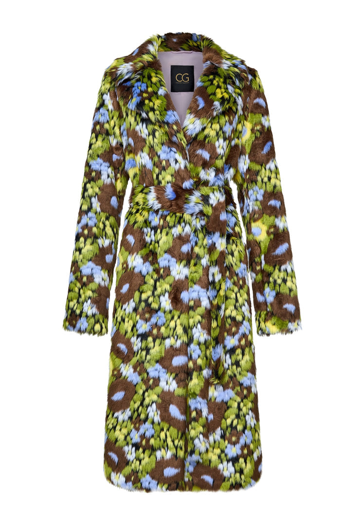 A woman in a fashionable long faux fur coat with a vibrant floral print, a trendy and stylish choice for chilly weather.