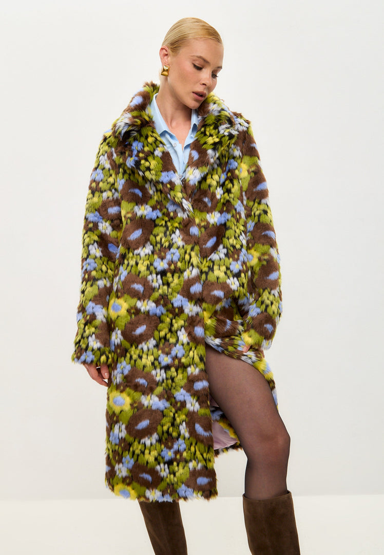 A stylish and trendy long faux fur coat with vibrant floral print, perfect for a fashionable winter look.