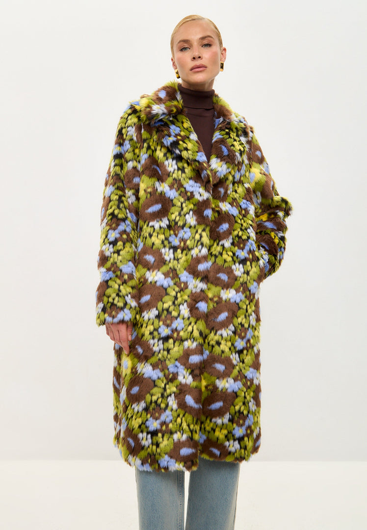 A stylish and fashionable long faux fur coat in a vibrant floral print design.