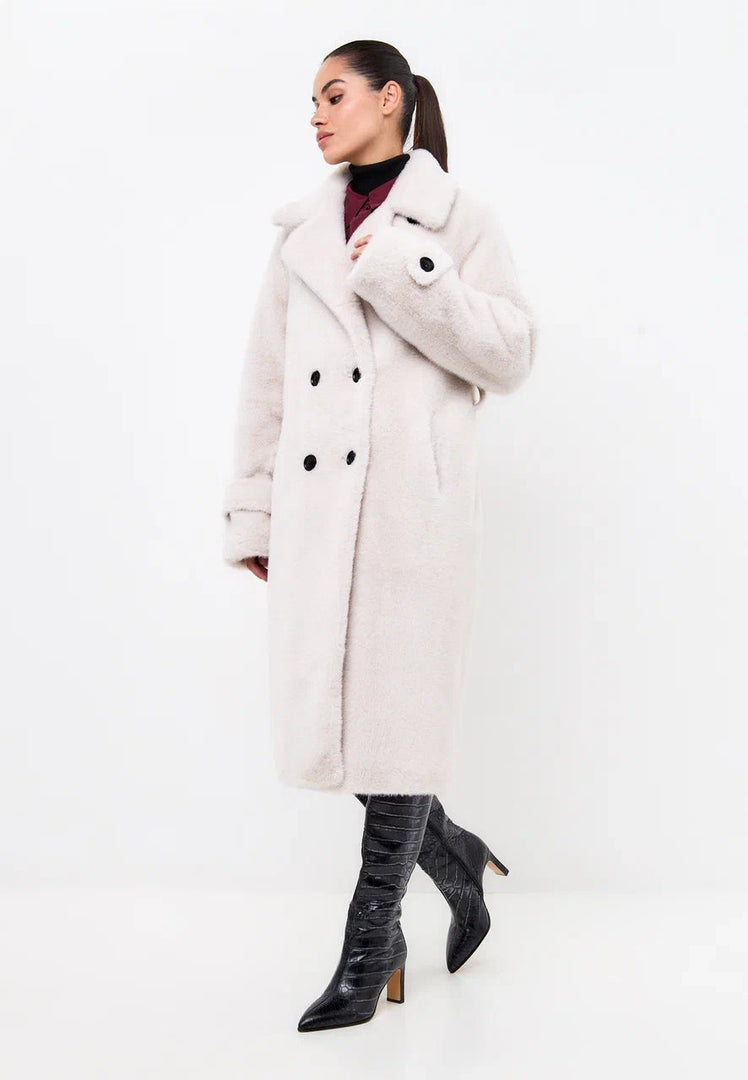 A stylish Miriam double-buttoned white faux fur coat, perfect for winter fashion.