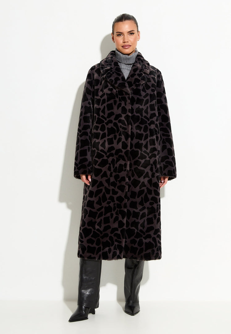 A stylish reversible animal print faux fur coat in black, perfect for winter fashion.