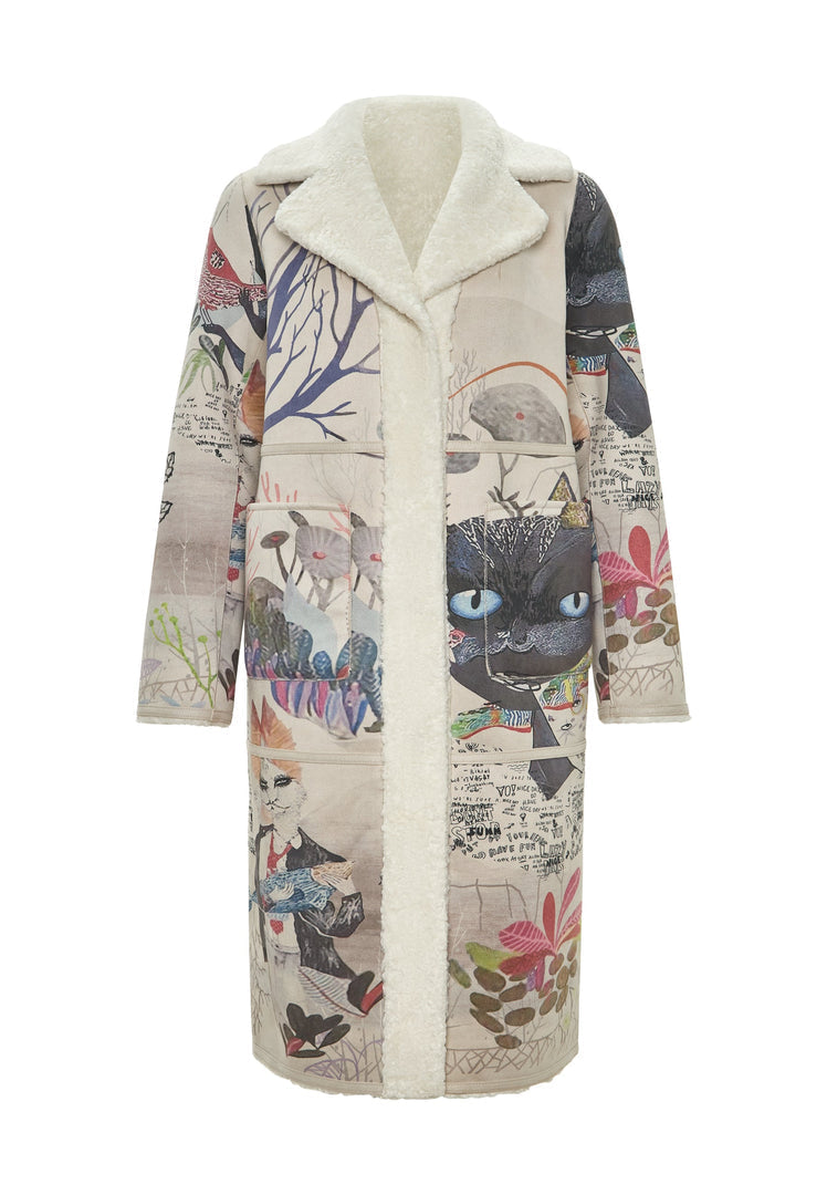 A fashionable women's white catty print reversible coat, perfect for staying stylish and cozy this season.