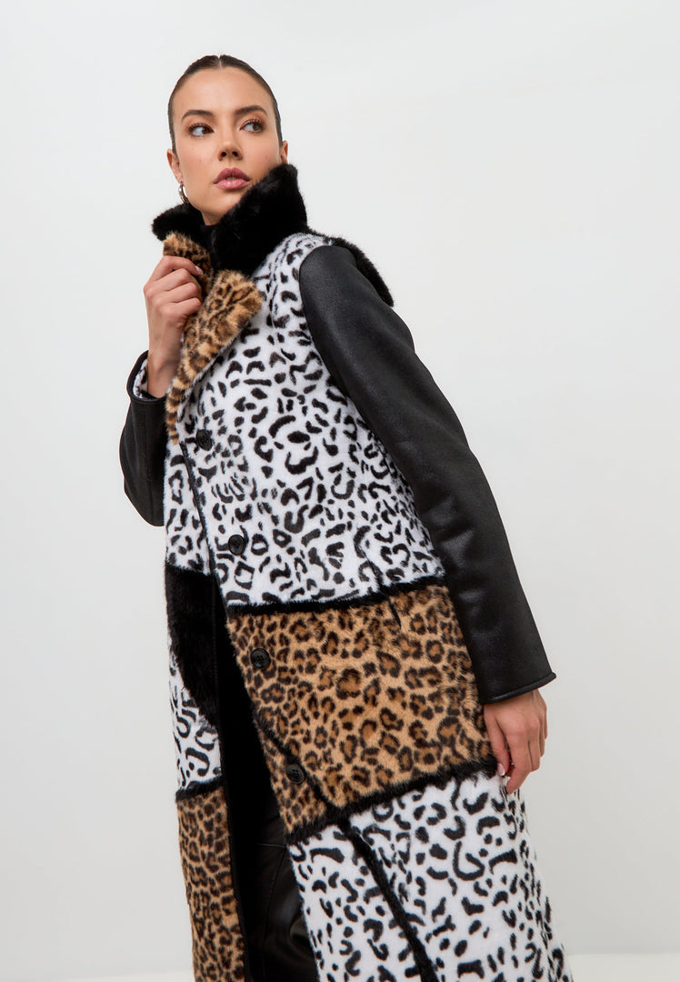 A stylish reversible faux fur Flavia coat in a trendy leopard print with mixed prints for a fashionable look.