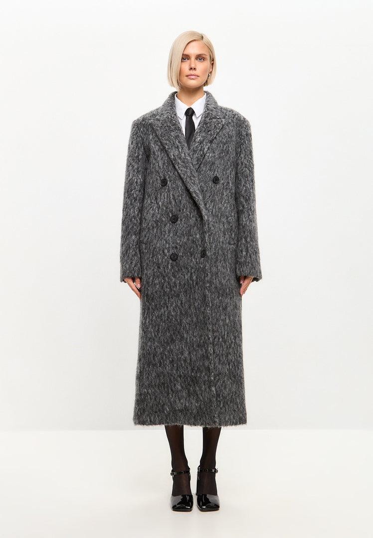 Stay warm and chic this winter with the trendy gray Eira coat - a stylish oversized wool coat that's perfect for any winter fashion outfit.