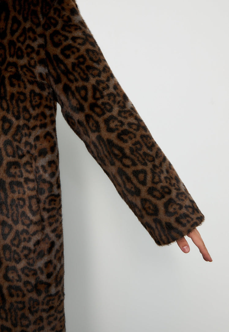 A chic and trendy leopard print faux fur coat by Ivy brand clothing, the epitome of stylish outerwear and luxury winter fashion.