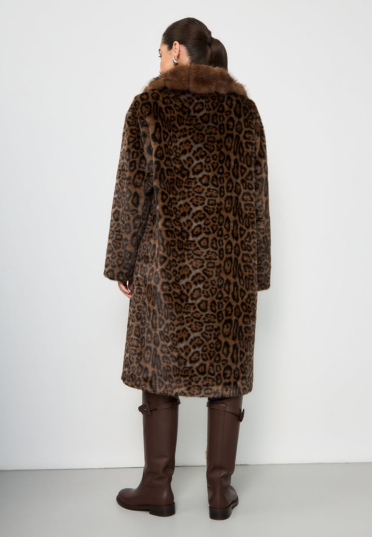 A chic and luxurious Leopard print faux fur coat from Ivy brand, perfect for staying stylish and cozy in the winter.