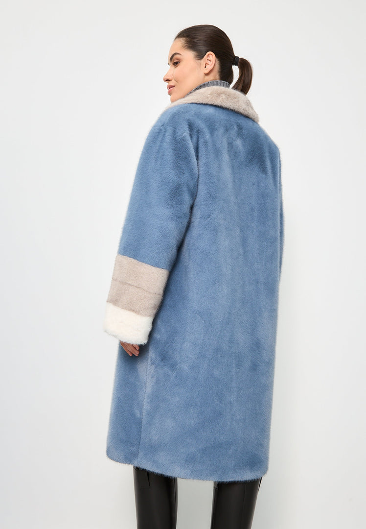 A stylish and sophisticated blue faux fur coat with crystal embellishments, the perfect elegant choice for winter fashion.
